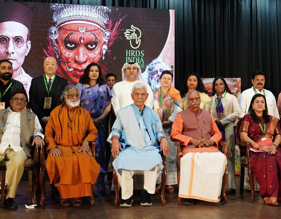 Group photograph of dignitaries at the Veer Savarkar International Impact Award 2025
