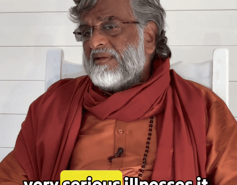 Guru AtmaNambi explaining the connection between passive anger, blocked chakras, and physical disease during a satsang.