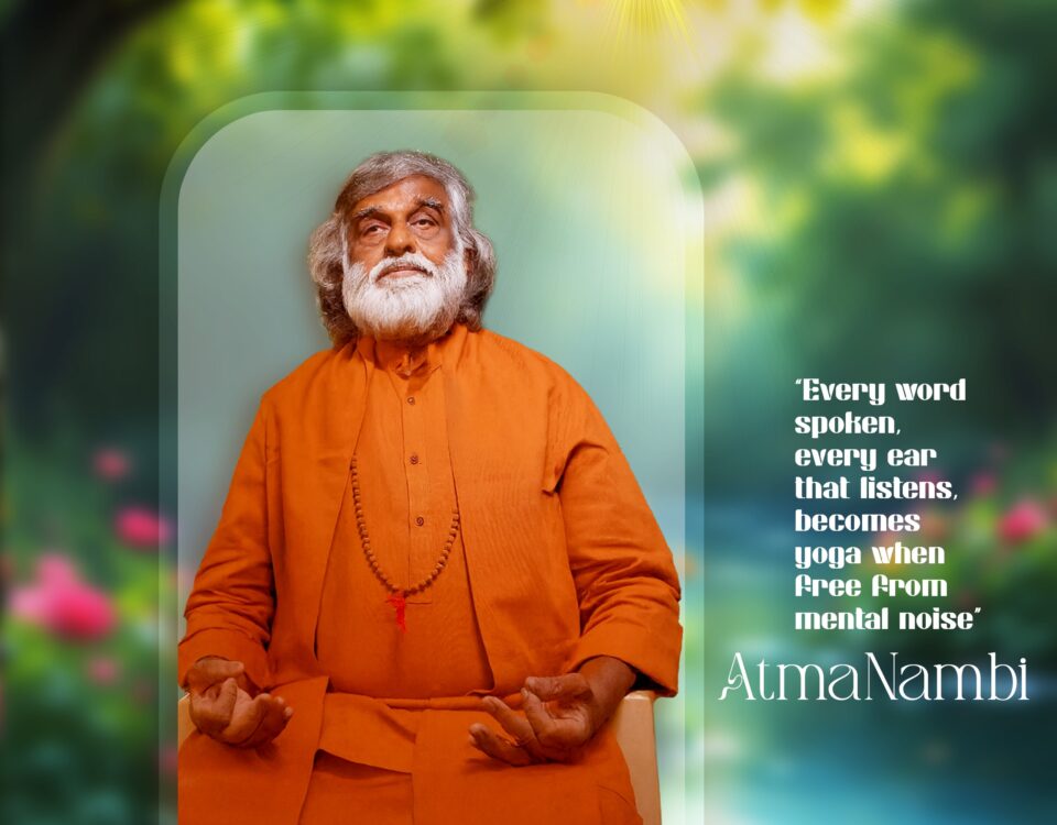 Guru AtmaNambi in orange robes meditating with a quote about being free from mental noise and the yoga of listening.