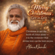 Guru AtmaNambi smiling in orange robes with a Christmas quote about divine love and spiritual awakening.