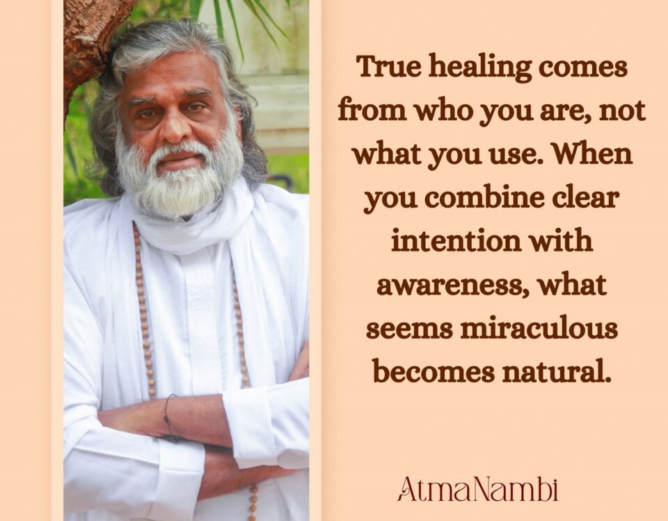 AtmaNambi in white spiritual attire with quote about true healing coming from who you are when clear intention combines with awareness to create natural miracles.