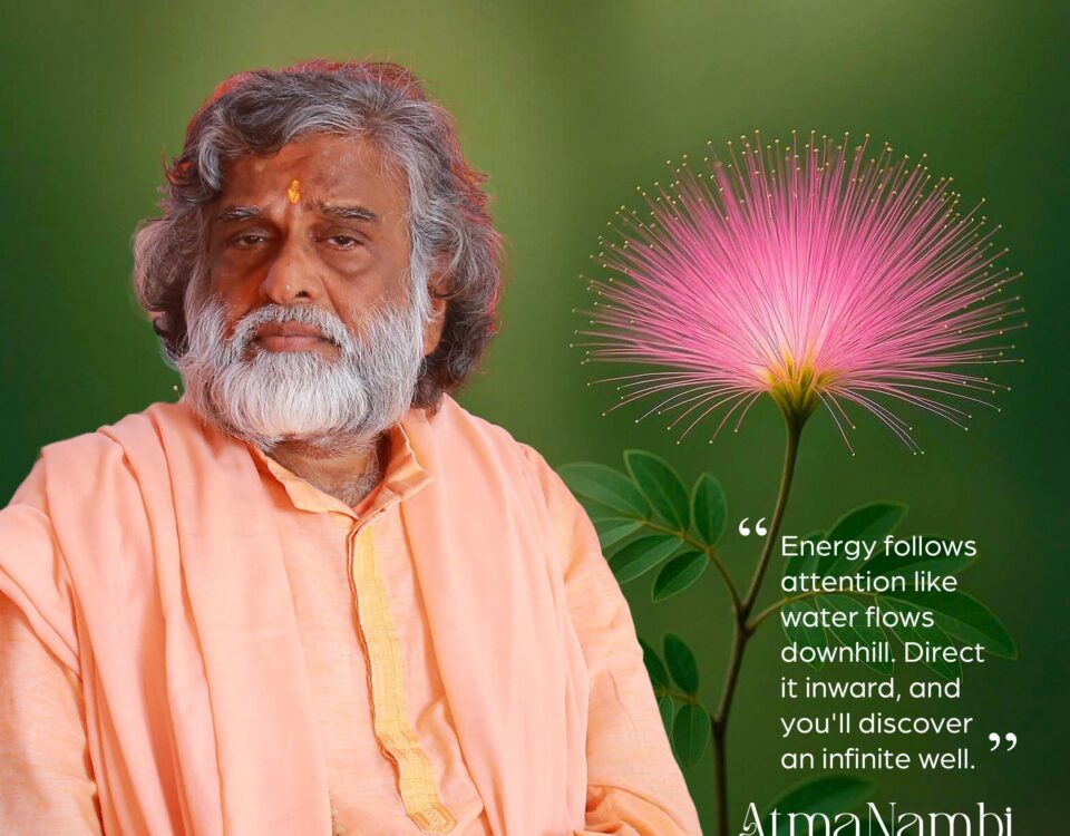 Portrait of Guru AtmaNambi with a pink flower, featuring the spiritual quote that energy follows attention like water flows downhill.