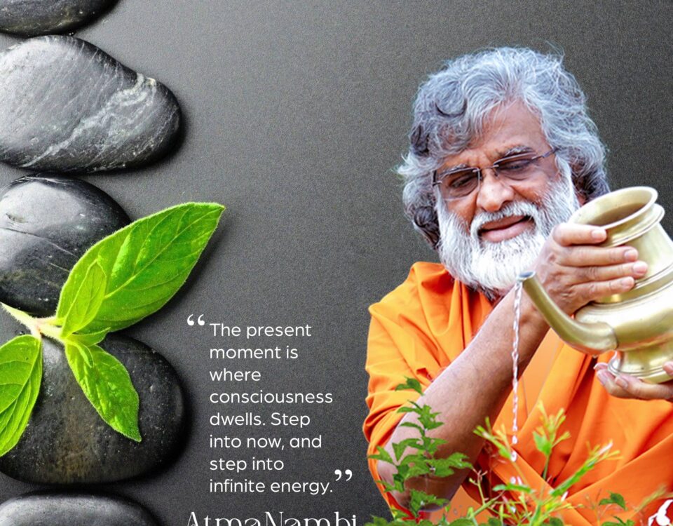 Guru AtmaNambi pouring water from a brass vessel alongside a spiritual quote about present moment consciousness and stepping into infinite energy.