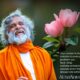 AtmaNambi spiritual master with pink lotus flowers teaching that your center is the solution and inner peace comes from seeking answers within.