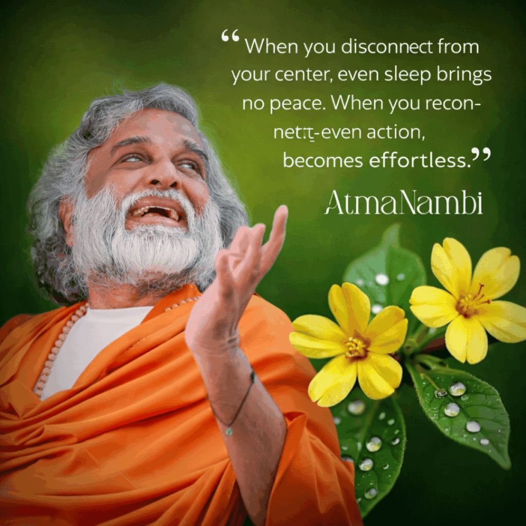 AtmaNambi spiritual master in orange robes with yellow flowers teaching that staying connected to your center brings peace and effortless action in daily life.