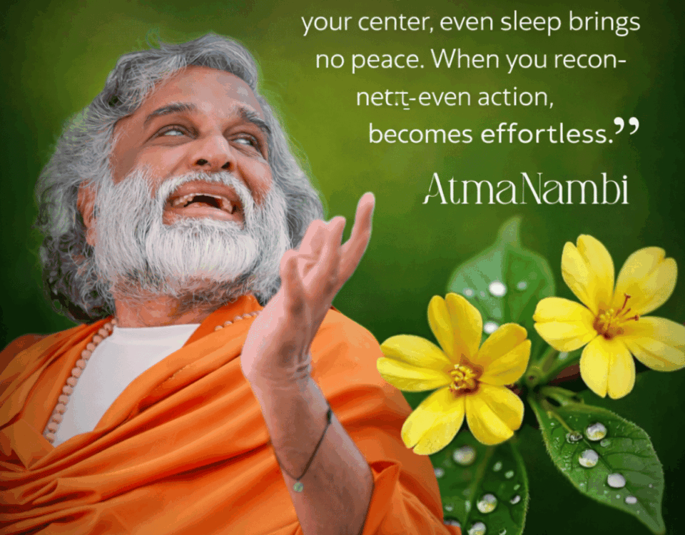 AtmaNambi spiritual master in orange robes with yellow flowers teaching that staying connected to your center brings peace and effortless action in daily life.