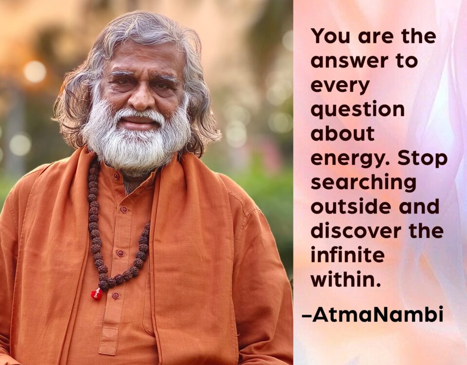 AtmaNambi spiritual quote poster showing the enlightened Indian master seated in meditation posture wearing orange kurta and rudraksha beads, sharing his teaching to discover infinite energy within and stop searching outside.