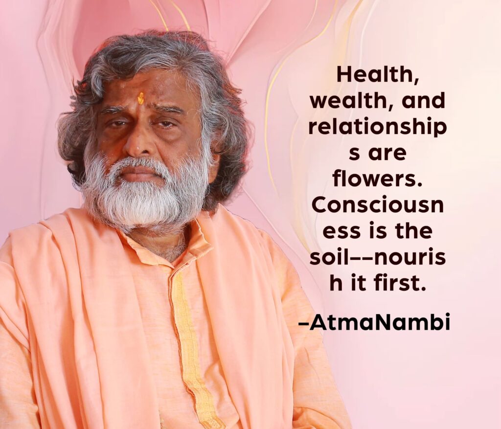 AtmaNambi spiritual quote poster featuring the enlightened Indian master in a peach kurta with a tilak on his forehead, sharing his teaching that consciousness is the soil and must be nourished first for health, wealth, and relationships to flourish.