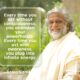 AtmaNambi spiritual quote poster showing the enlightened Indian master in white robes seated outdoors amidst greenery, sharing his teaching that acting with awareness plugs you into infinite energy while unconscious action abandons your inner powerhouse.