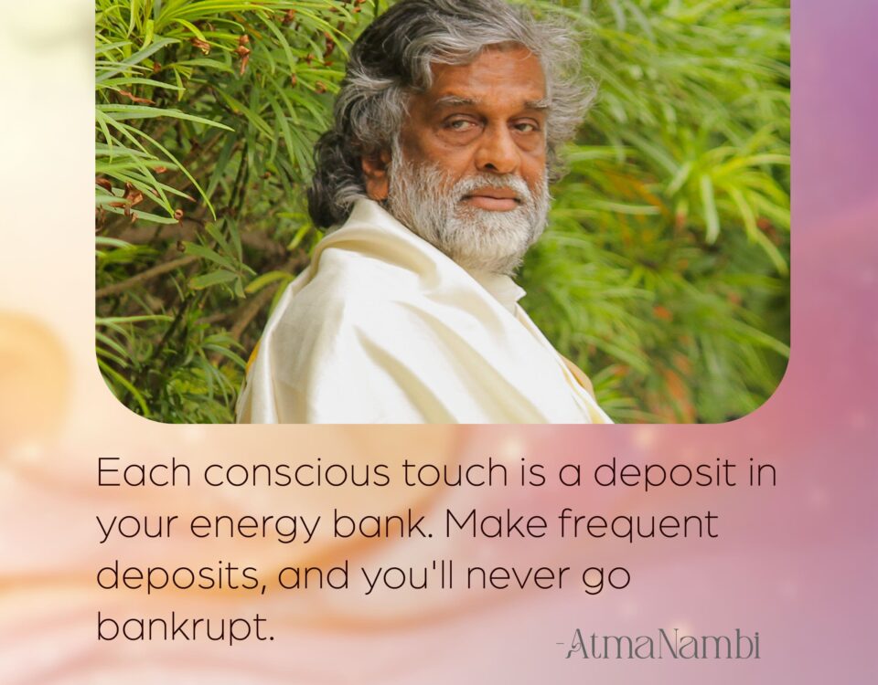 AtmaNambi spiritual poster with quote on conscious touch as energy bank deposits, featuring the enlightened master in white robes amid lush green foliage with a steady, grounded gaze.