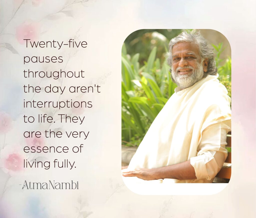 AtmaNambi spiritual poster with quote on daily pauses as the essence of living fully, featuring the enlightened master in cream robes seated outdoors in warm natural light with a gentle joyful smile.
