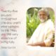 AtmaNambi spiritual poster with quote on daily pauses as the essence of living fully, featuring the enlightened master in cream robes seated outdoors in warm natural light with a gentle joyful smile.