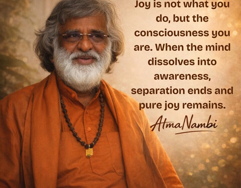 AtmaNambi spiritual poster with quote on joy as pure consciousness when the mind dissolves into awareness, featuring the enlightened master in rust-orange robes with a rudraksha mala against a warm golden bokeh background.