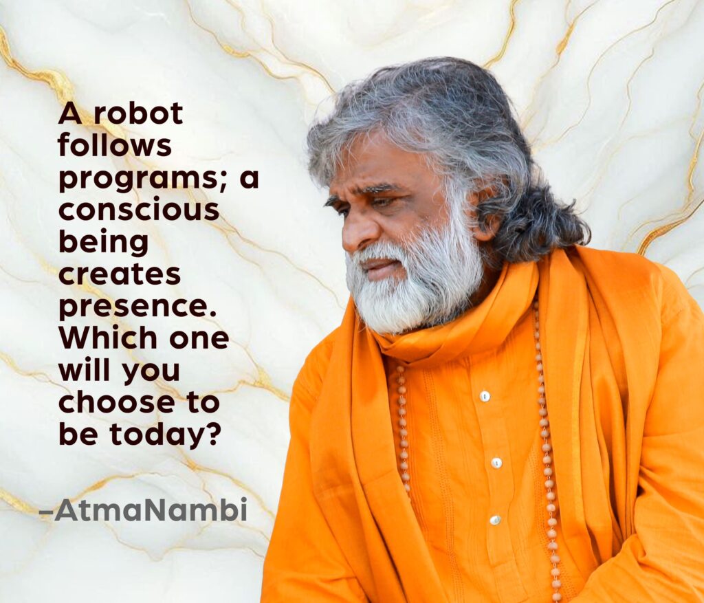 AtmaNambi, Indian enlightened master in saffron robes in deep contemplation, with his conscious being spiritual teaching: "A robot follows programs; a conscious being creates presence."