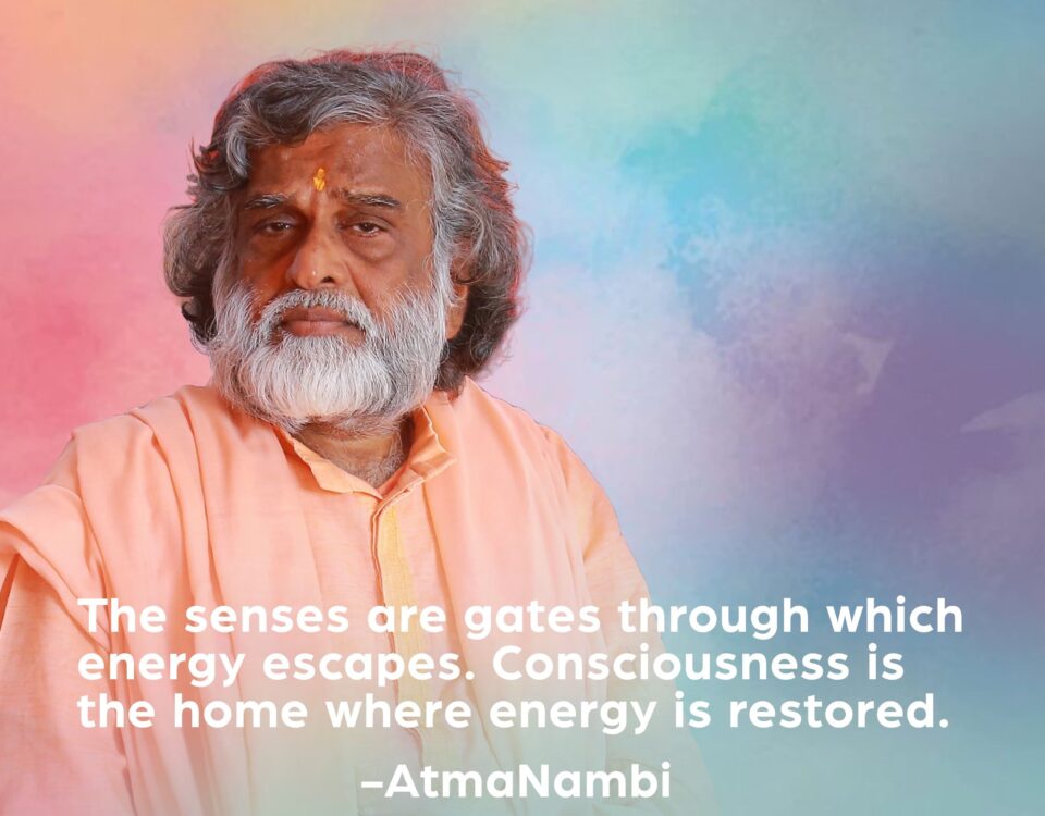 AtmaNambi, Indian enlightened master in soft peach robes with a deeply contemplative gaze, sharing his consciousness restores energy spiritual teaching about the senses as gates of energy loss.
