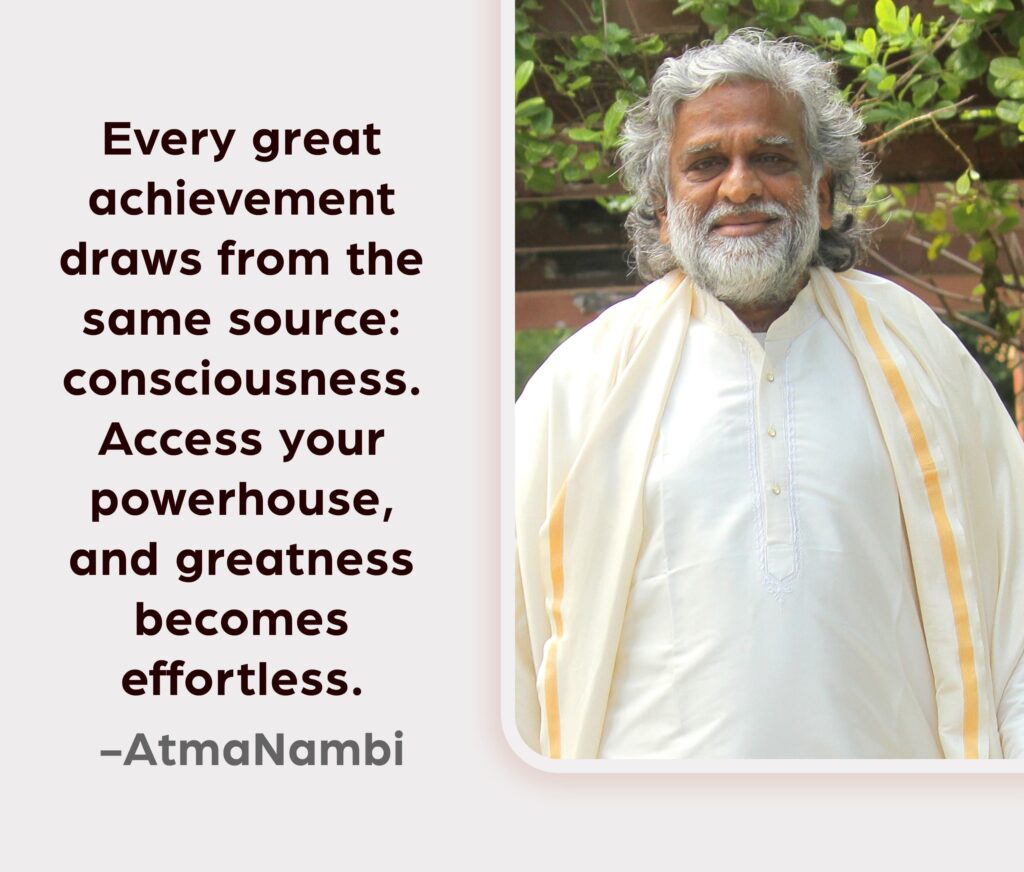 AtmaNambi, Indian spiritual master in white and gold robes, beside a spiritual quote on consciousness as the source of effortless greatness and inner power.