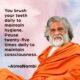 A spiritual poster featuring AtmaNambi in orange robes with his quote on pausing twenty-five times daily to maintain consciousness — an AtmaNambi daily consciousness practice teaching.