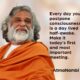 A spiritual poster of AtmaNambi in orange robes with his teaching on postponing consciousness — urging seekers to make wakefulness today's first and most important meeting.