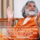 AtmaNambi speaking with open hands and upward gaze, sharing his teaching on coming home to your inner center as the destination of every spiritual journey.